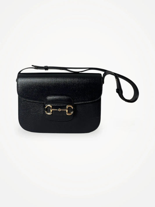 Gucci-skinnaxelremsväska