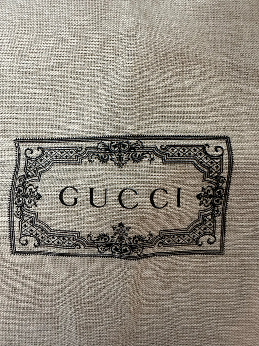 Gucci-skinnaxelremsväska