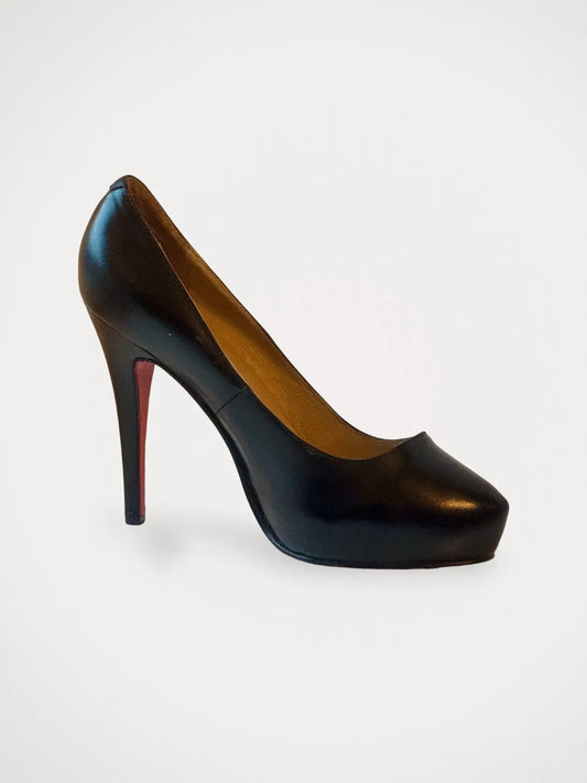 Christian Louboutin-skinnklackar